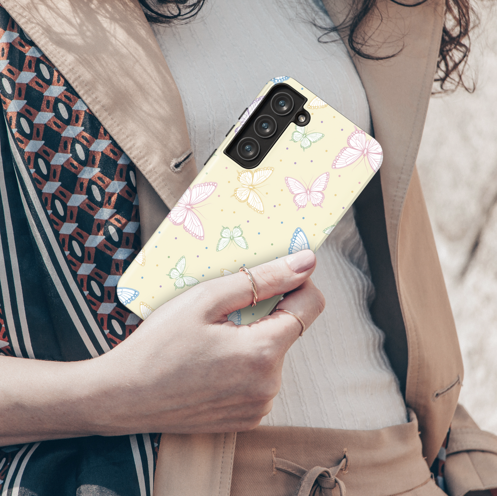 Galaxy phone case with pastel butterfly design and cream background – whimsical and cute feminine aesthetic