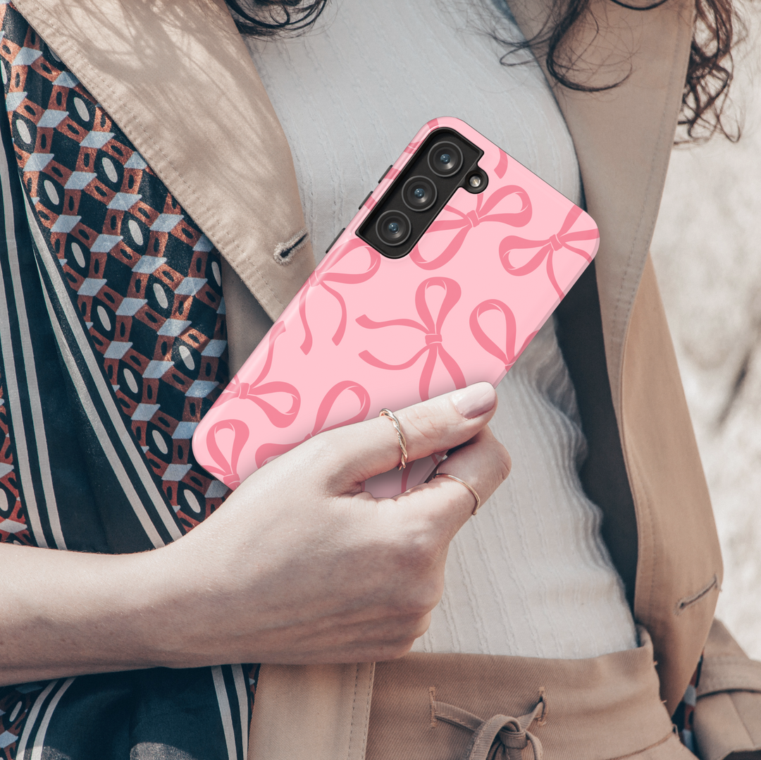 Red Samsung Galaxy case with large pink bow pattern – bold coquette aesthetic phone cover for women, glossy and protective