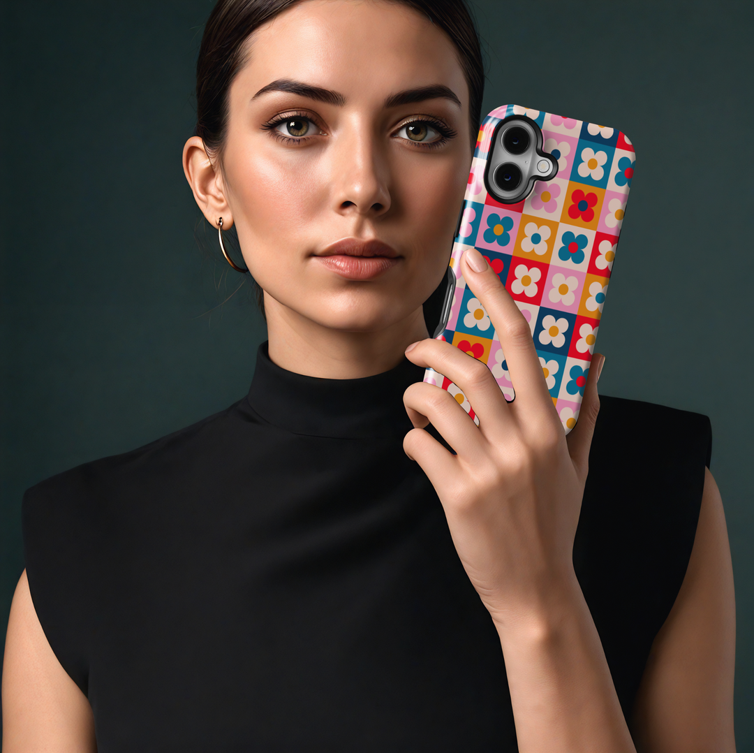 Phone 16 case for women with colorful retro checkerboard floral design, MagSafe compatible groovy daisy pattern phone case, bright and playful protective cover