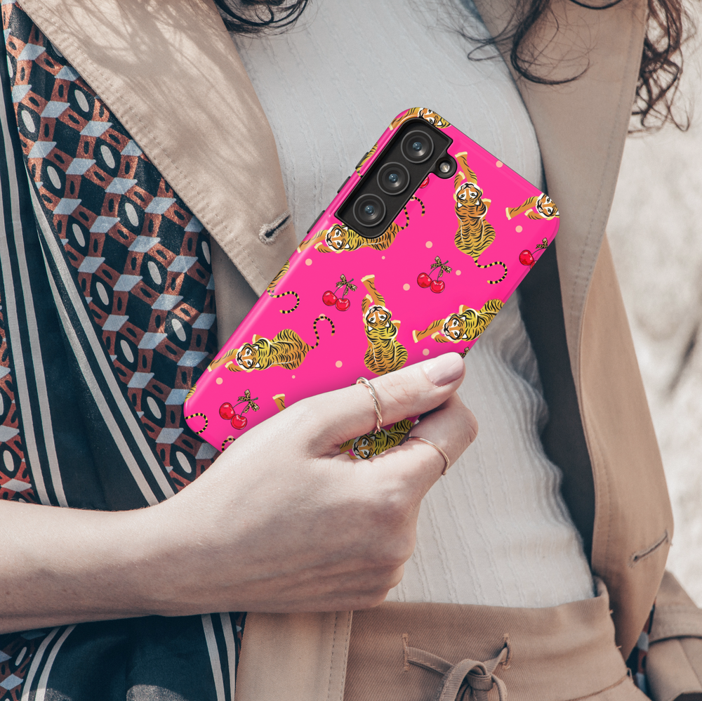 Hot pink Galaxy case with playful tiger and cherry pattern, featuring leopard print bows – bold and fun Samsung phone cover