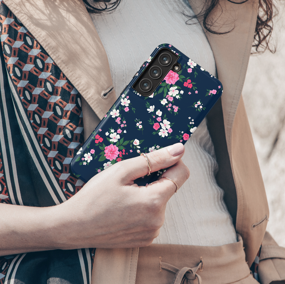 Navy blue Samsung Galaxy case with pink and white floral design – elegant and feminine aesthetic protective phone cover