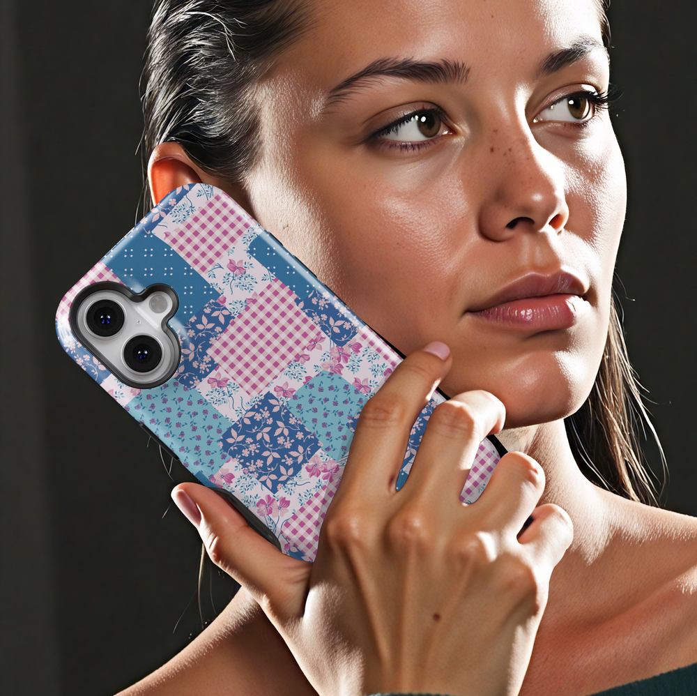 Vintage-inspired patchwork iPhone case featuring blue and pink floral patterns, gingham prints, and a quilted aesthetic for a cozy country look.