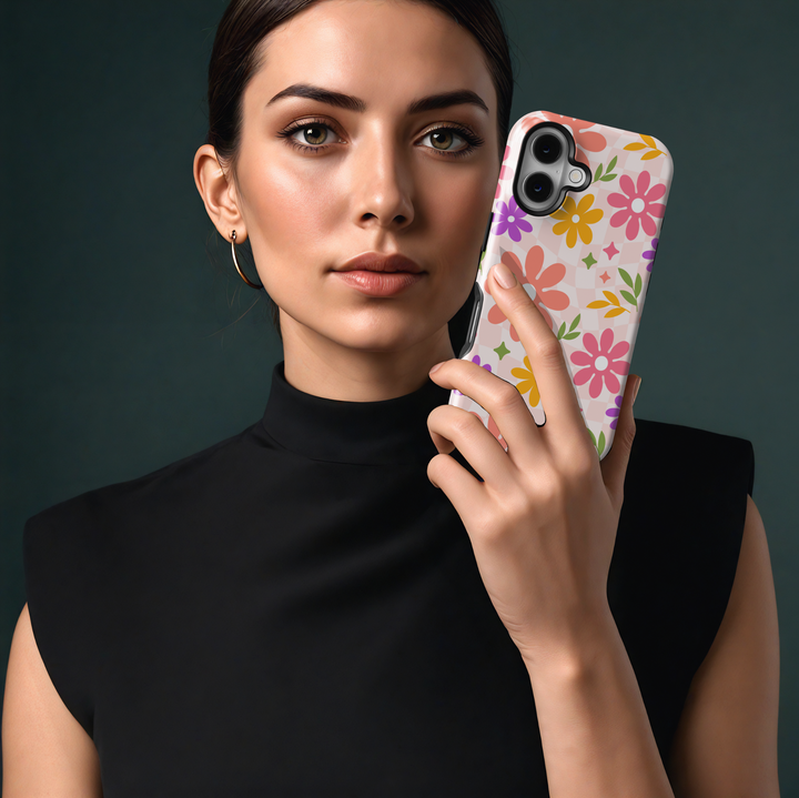 Colorful retro floral iPhone case with wavy checkered background, featuring pink, yellow, and purple flowers for a groovy aesthetic.