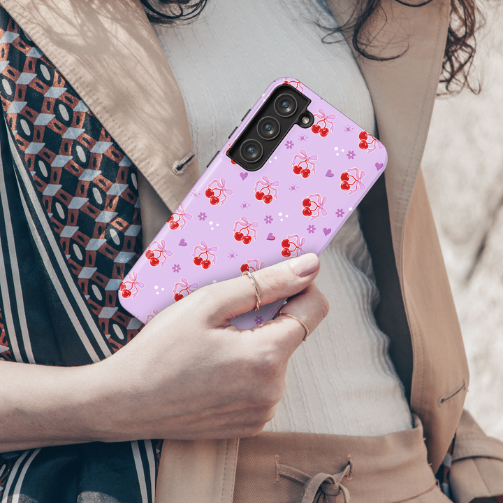 Coquette Purple Samsung Galaxy case with red cherries, heart bows, and floral accents – cute girly aesthetic protective phone cover
