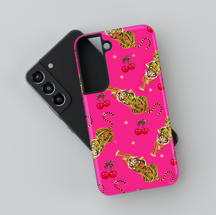 Hot pink Galaxy case with playful tiger and cherry pattern, featuring leopard print bows – bold and fun Samsung phone cover