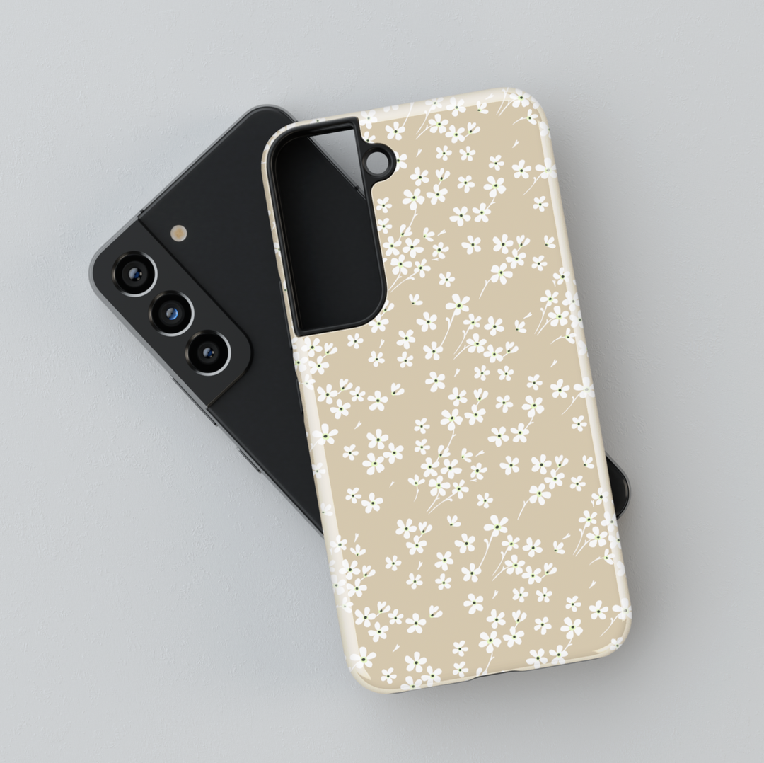 Neutral beige Galaxy case with tiny white floral pattern – minimalist aesthetic phone cover