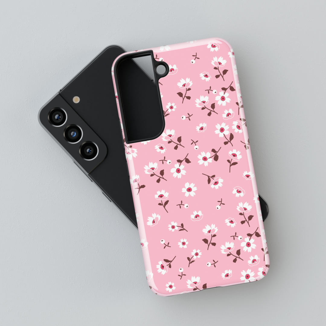 Pink floral Galaxy phone case with small white flowers and red accents – cute girly phone case