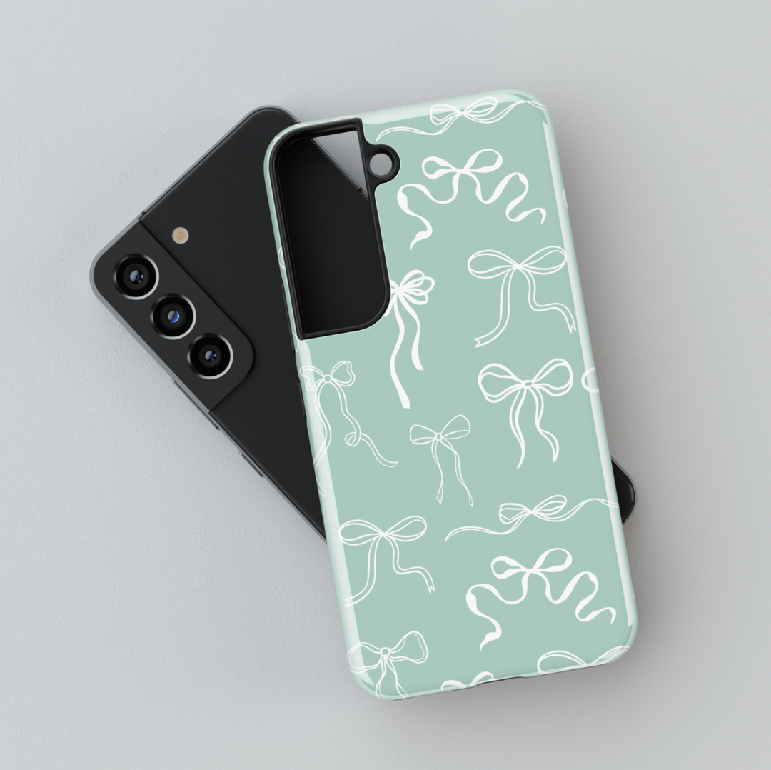Mint green Samsung Galaxy case with white ribbon bow pattern – soft coquette aesthetic girly protective phone cover for women