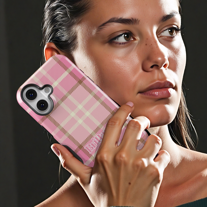 Personalized pink plaid iPhone case with custom name. Stylish and trendy phone cover with a preppy aesthetic, perfect for a girly and elegant look.