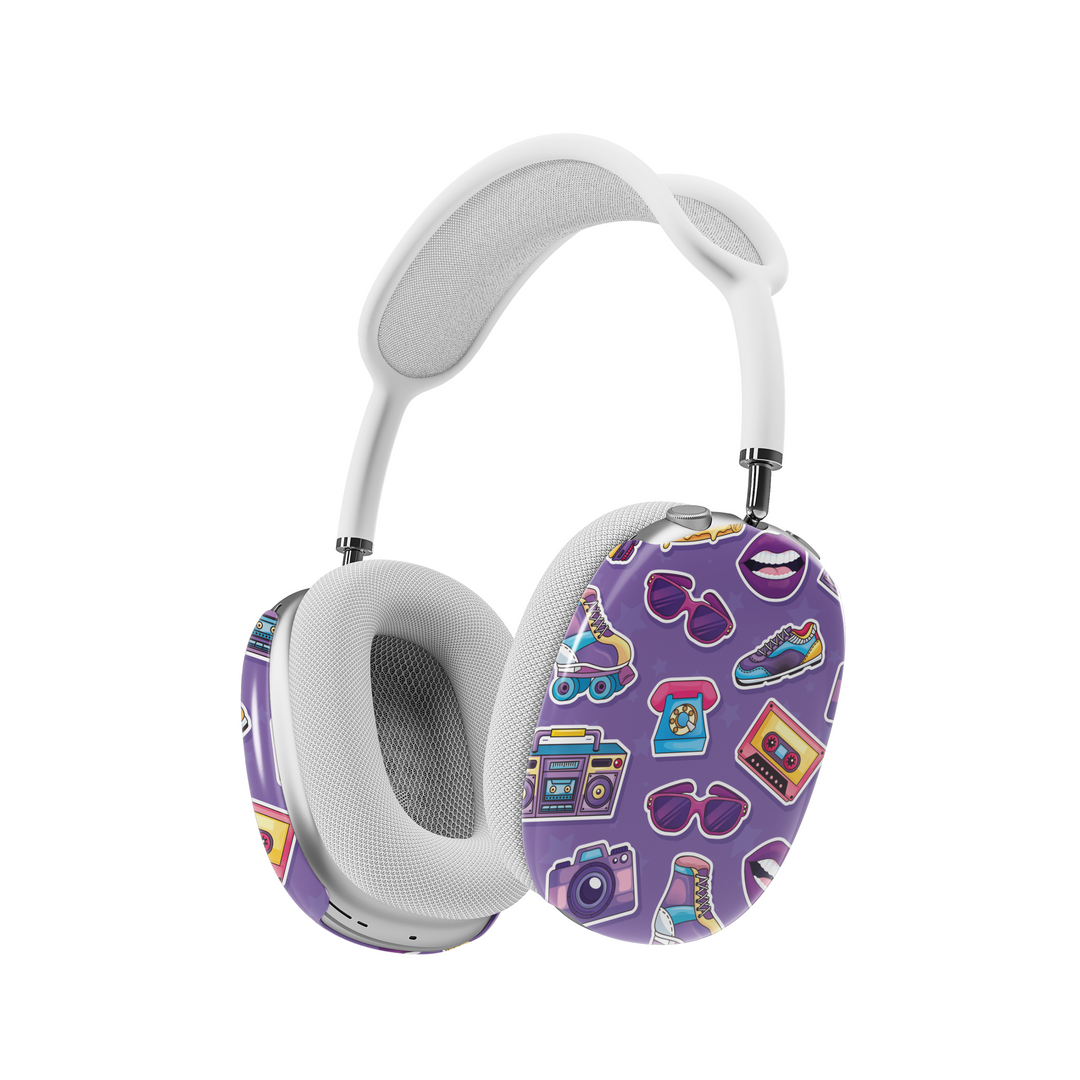 Purple AirPods Max cover with colorful retro stickers including cassettes, cameras, lips, sneakers, and phones, Y2K aesthetic headphone skin for Apple AirPods Max.