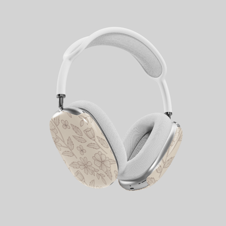 Beige AirPods Max cover with delicate brown floral line art, minimalist botanical headphone skin for Apple AirPods Max, elegant neutral tech accessory.
