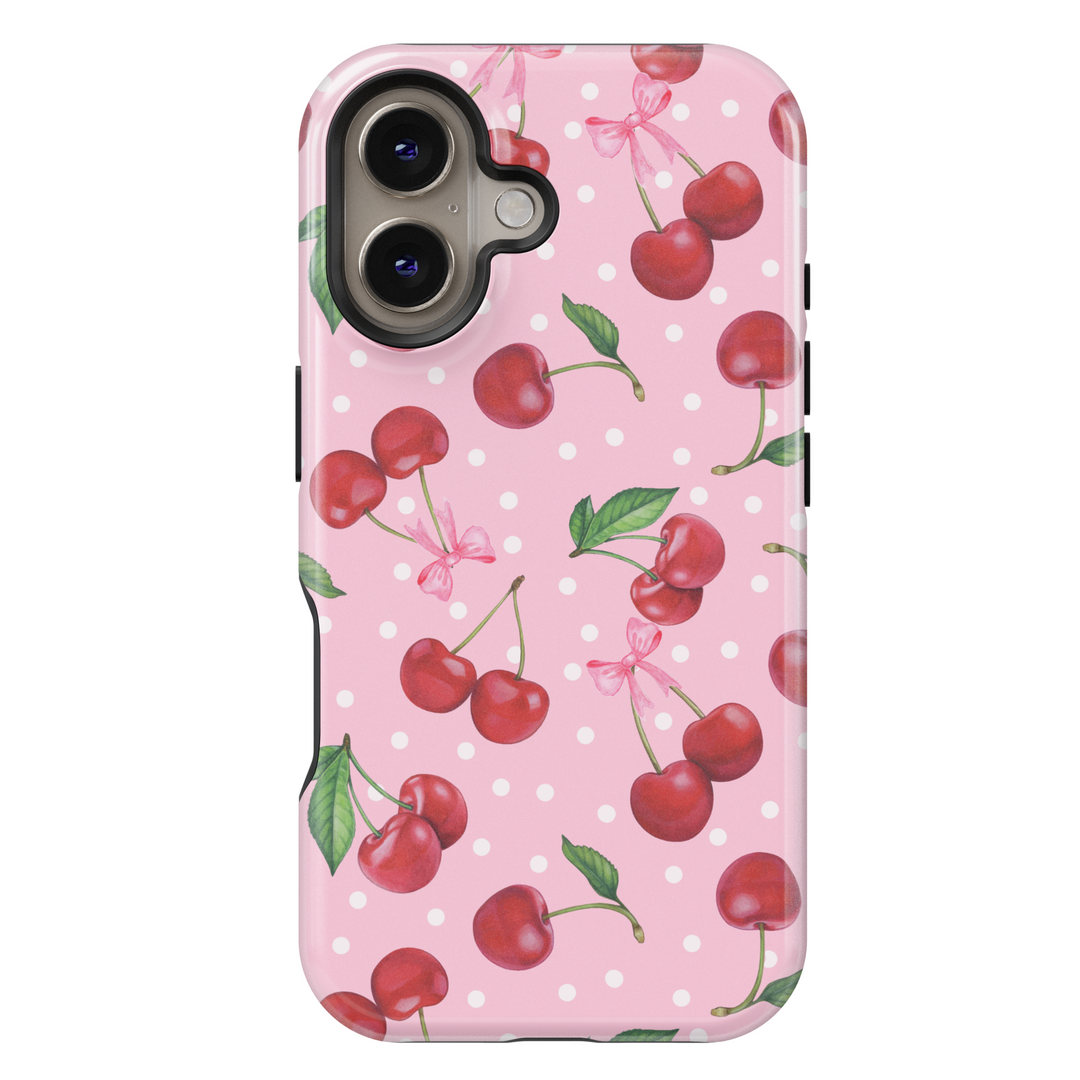 Pink iPhone 16 MagSafe case with red cherries, bows, and white polka dots – Cherry Pop
