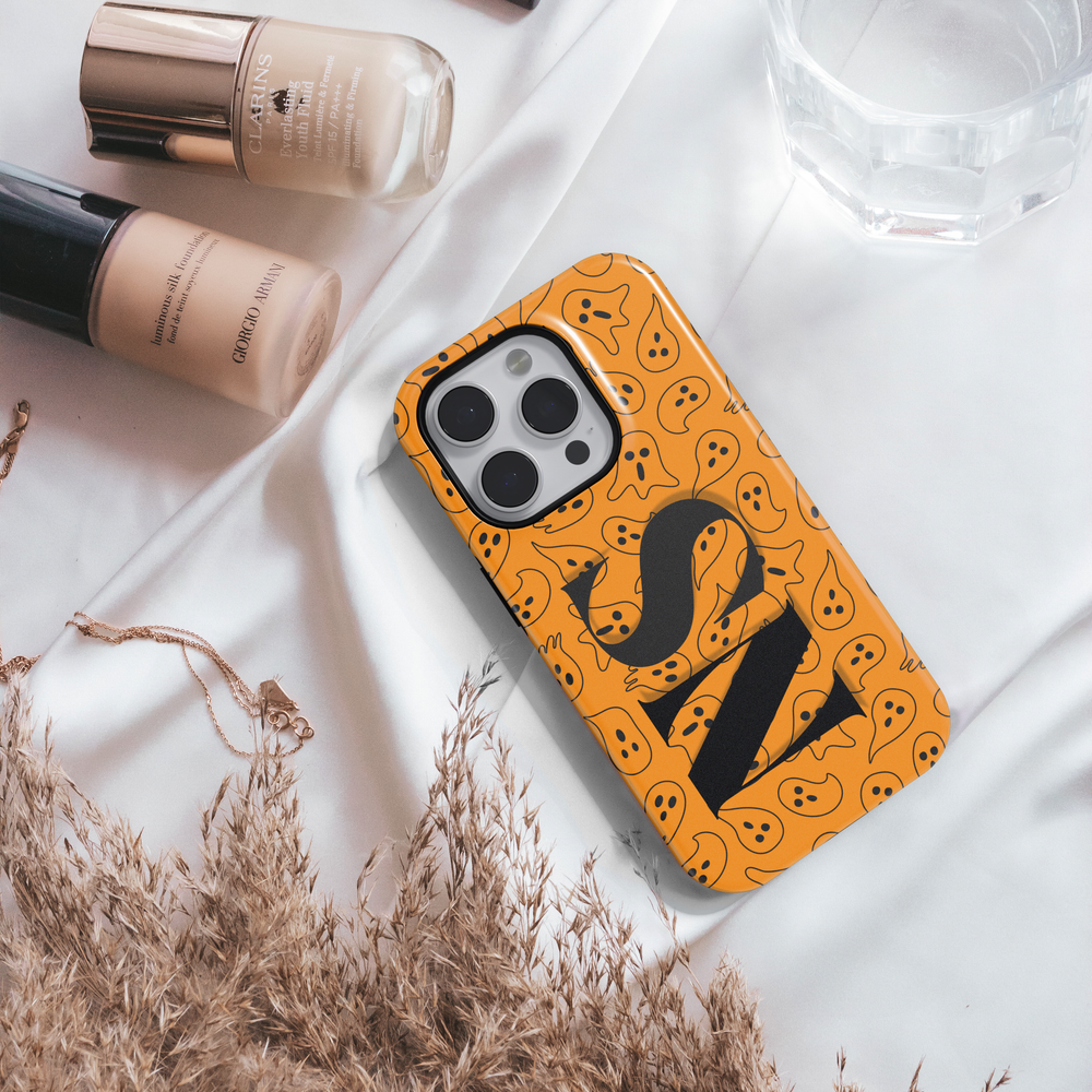 Orange Ghost Pattern iPhone Case with Black Monogram – MagSafe iPhone 16 Pro Max Case for Women