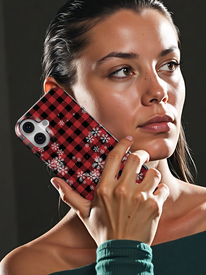 Red and black buffalo plaid iPhone case with white snowflakes holiday winter pattern