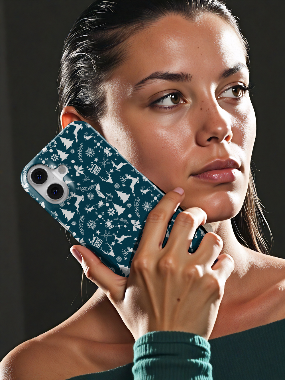 Christmas Samsung Galaxy phone case with white reindeer, snowflakes, bows, and holiday icons on a deep teal background